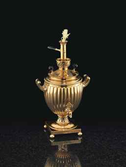 a_gold_table_lighter_in_the_form_of_a_miniature_samovar_marked_faberge_new_york_design_agenda